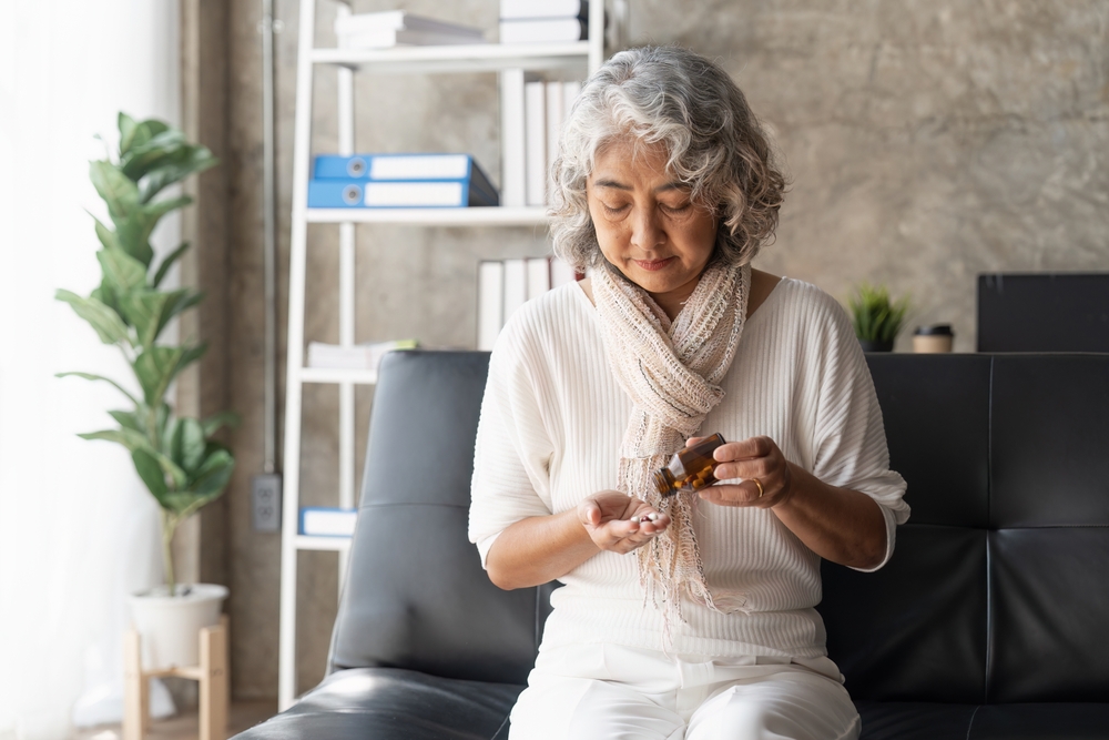 Lady taking medicine