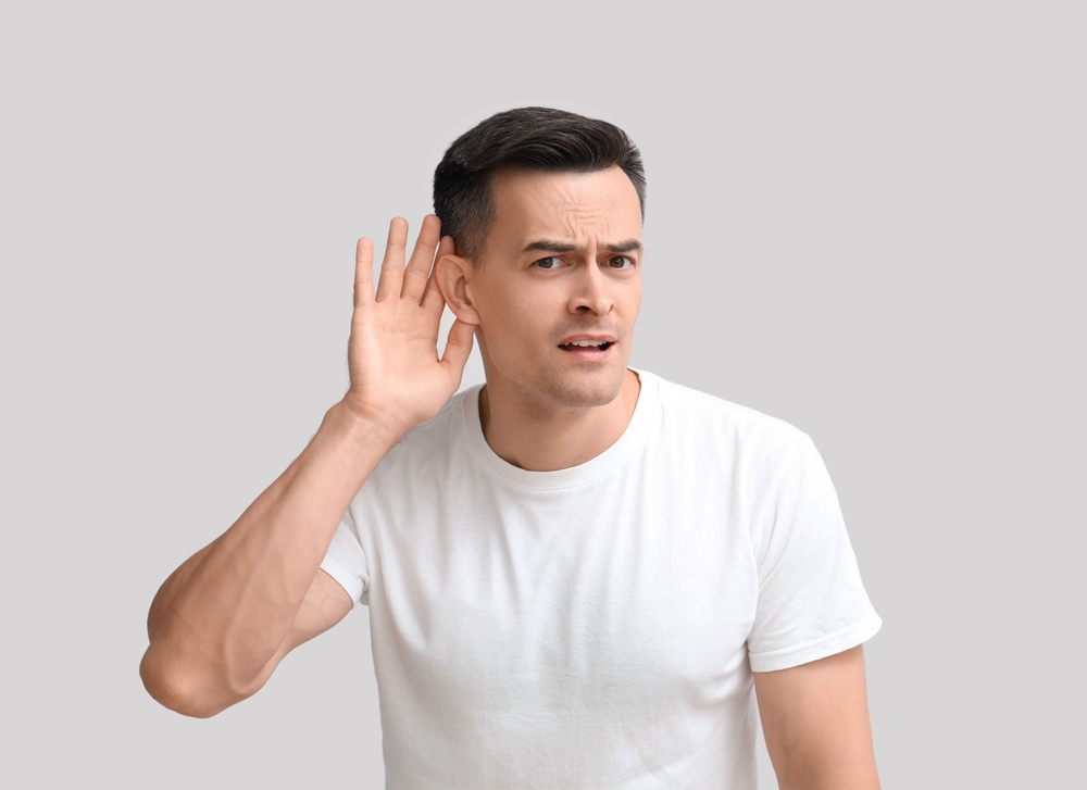 Man struggling to hear